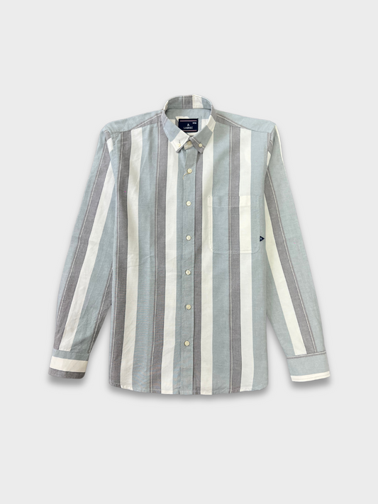 Striped shirt with long sleeves on a light gray background